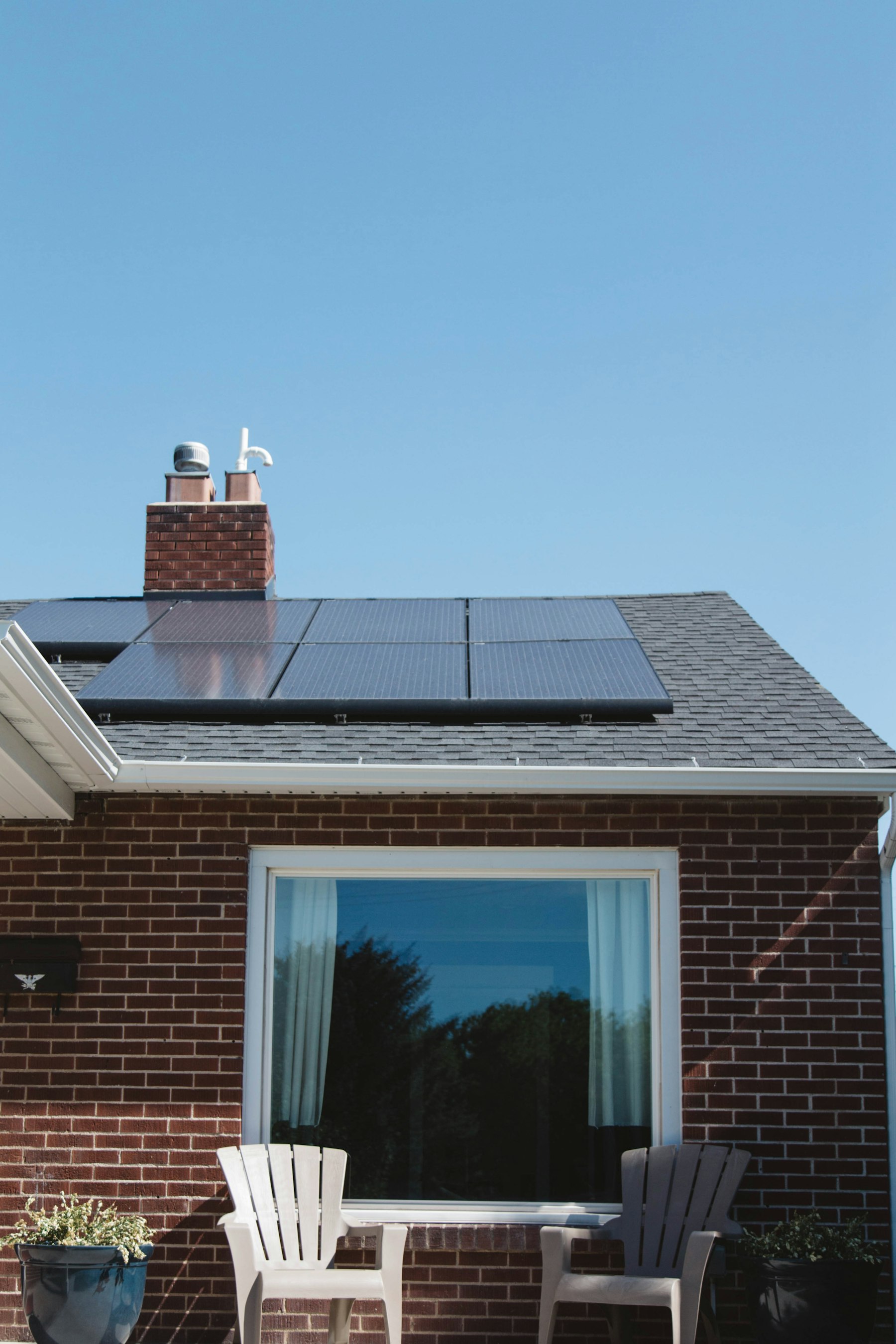 Home rooftop with installed solar panels